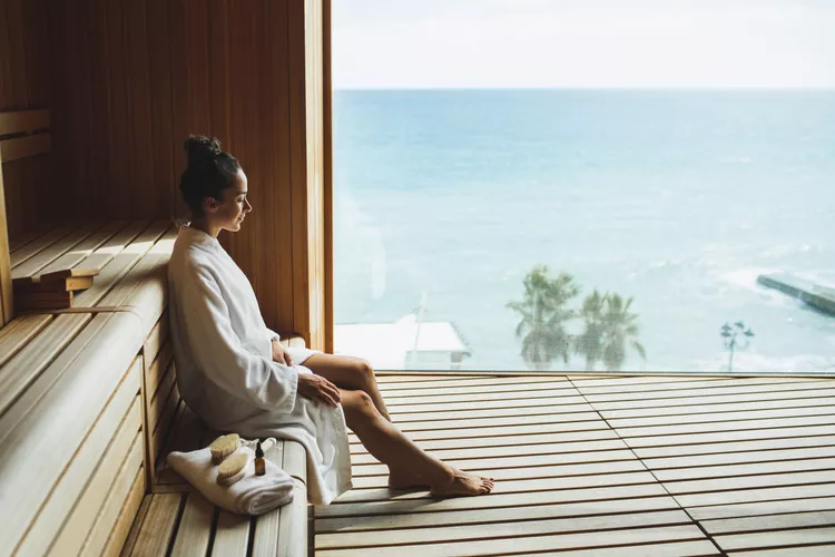 Person relaxing in a sauna